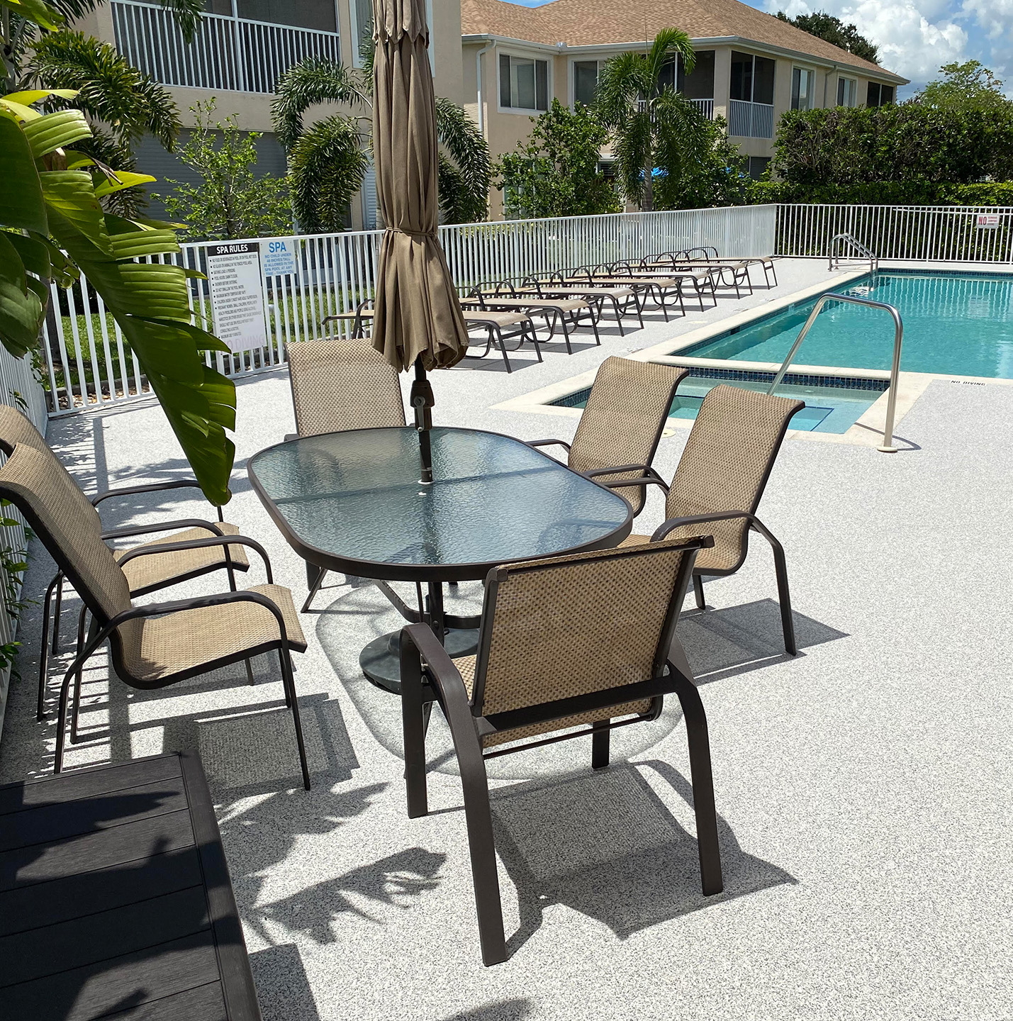 Rubberized coating on commercial pool deck.