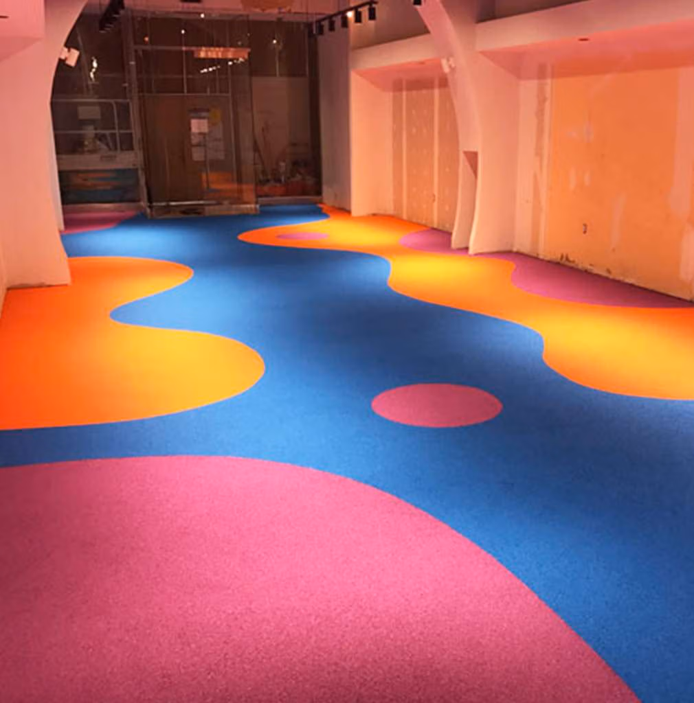 Brightly-colored rubberized floor for a toystore in Houston, Texas.